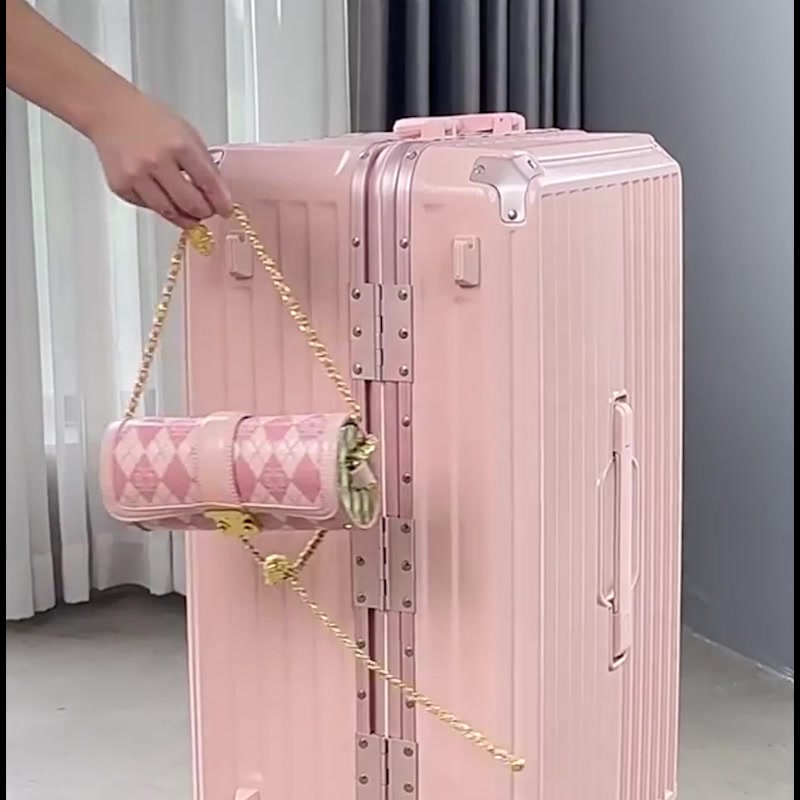 悠客NEWCOM铝框行李箱：商务精英的“移动堡垒”还是旅行者的“时尚灾难”？