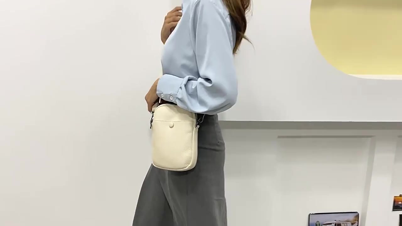 40+姐姐的环保新宠!VANDEE头层牛皮手机包,简约又实用