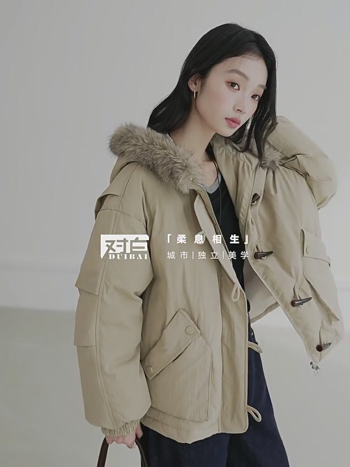 对白这件牛角扣羽绒服，我穿了一周才敢说：值回票价！